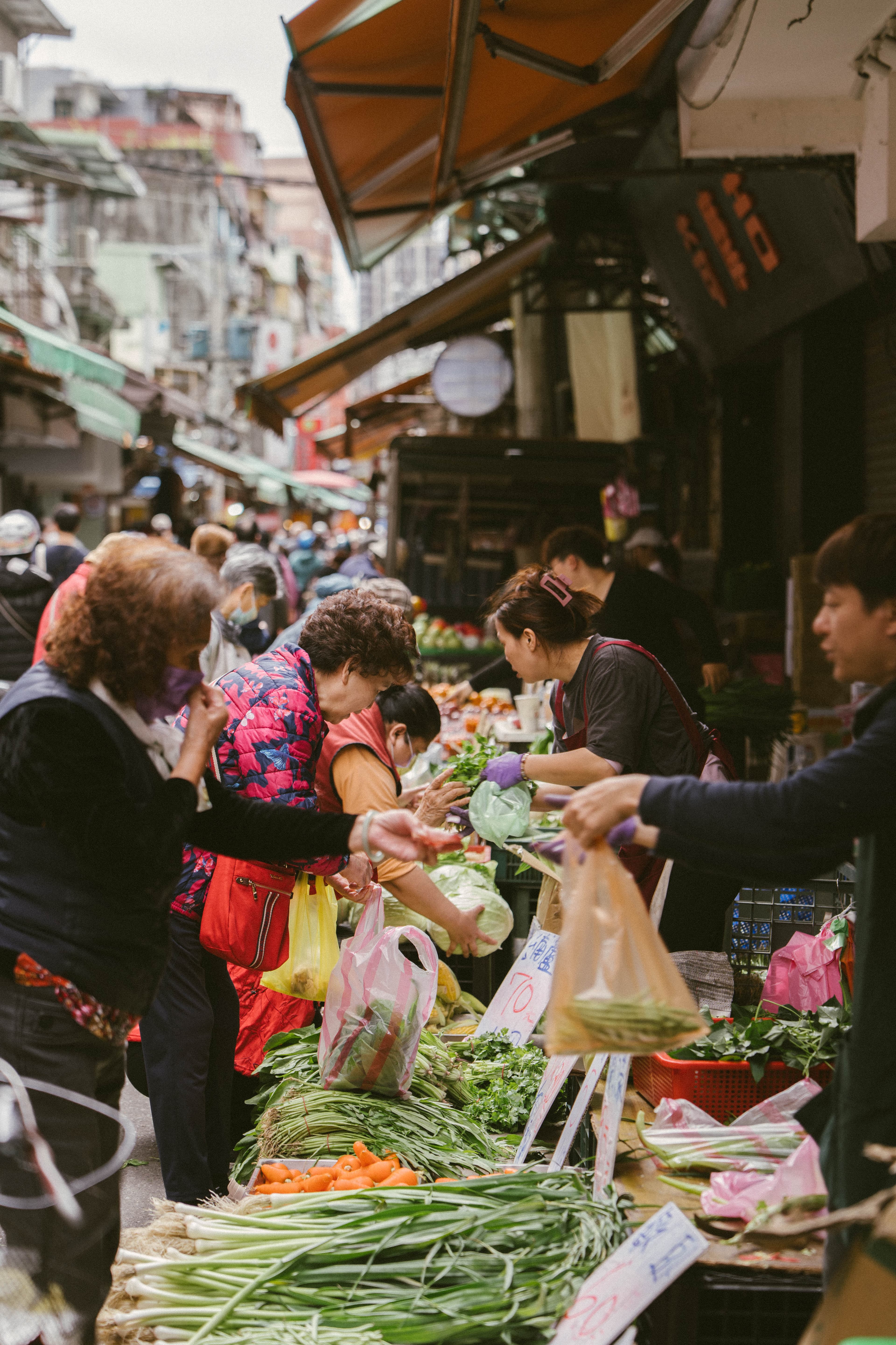 market customers purchasing produce
